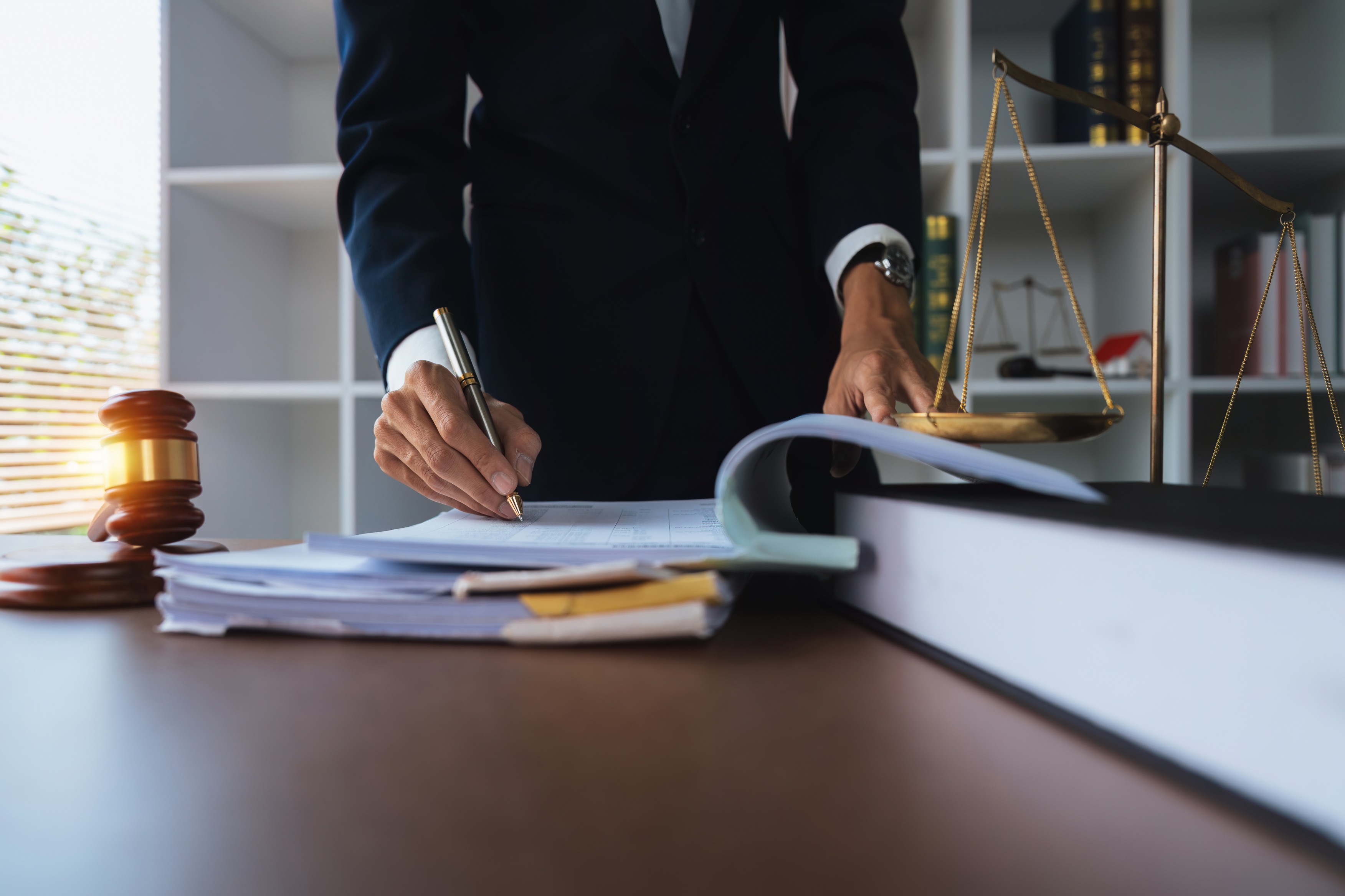 Solicitor reviewing employment documents